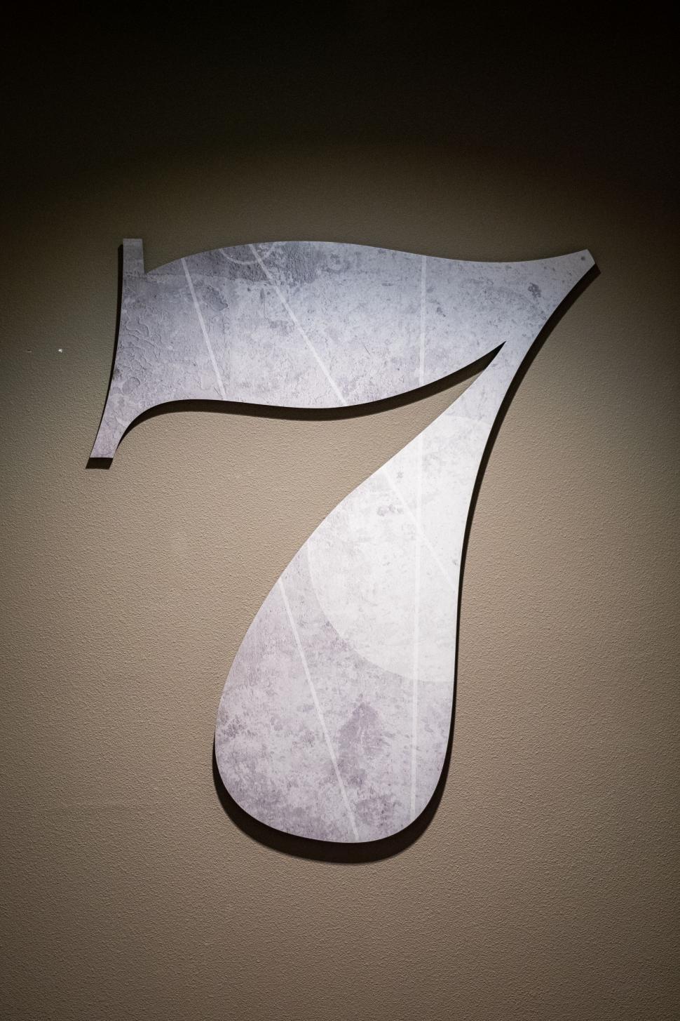 Free Image of Minimalist Nike swoosh wall d?cor 