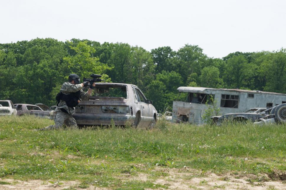 Free Image of Junkyard paintball game 