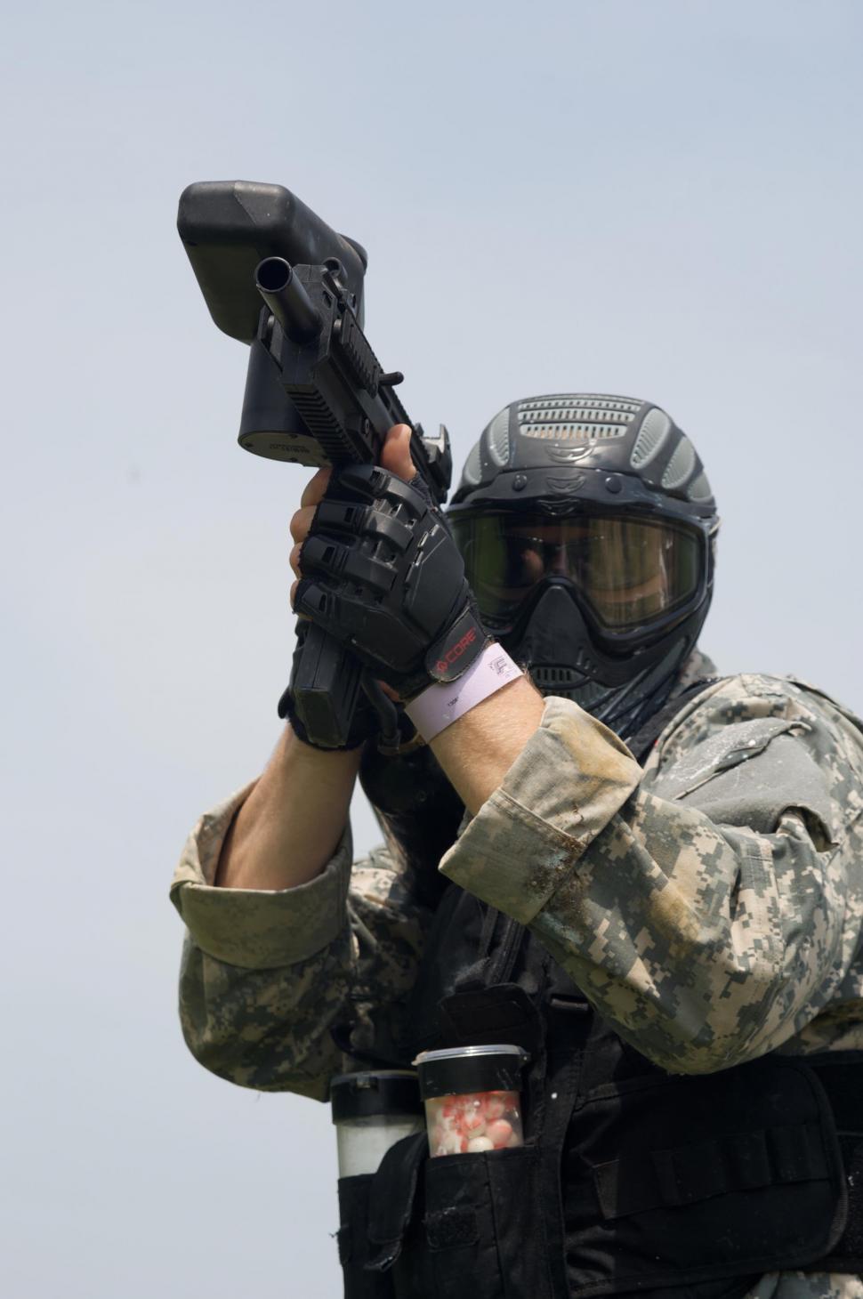 Free Image of Paintball player with clear sky in the background  