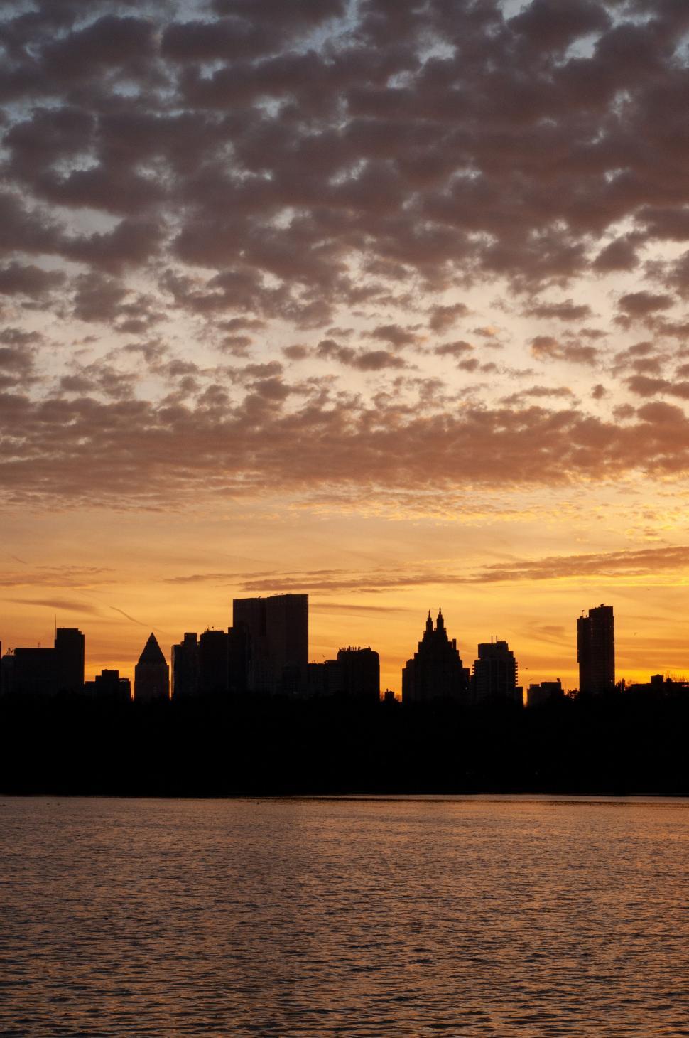 Free Image of Cityscape Overlooking Vast Body of Water 