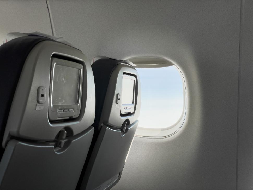 Free Image of Airplane interior with view through window 