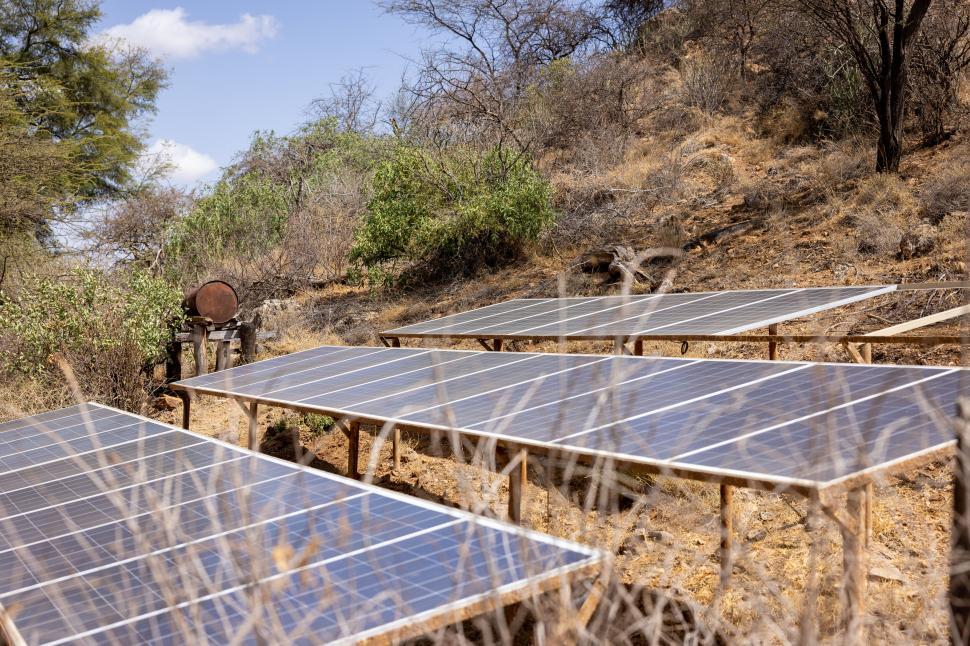 Free Image of Solar Panels Line the Hillside 