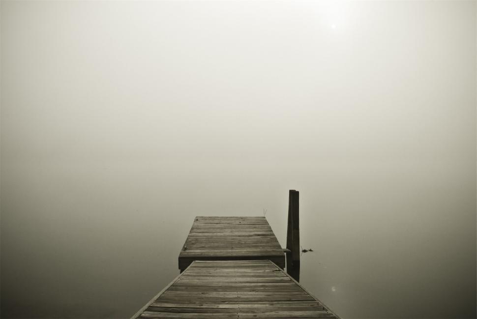 Free Image of Foggy lake with empty wooden dock 