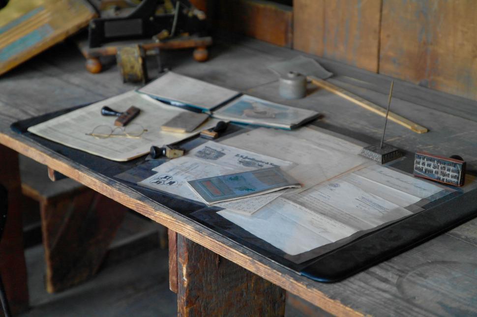 Free Image of Vintage desk with various old items 