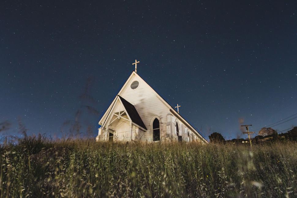 Free Image of Historic country church under a starlit sky 