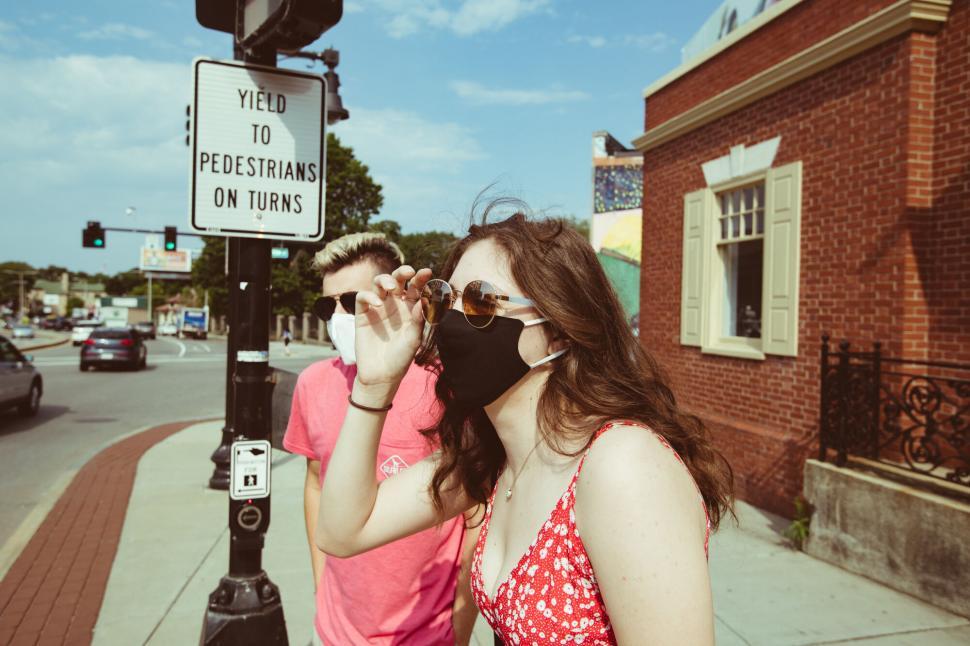 Free Image of Blurred faces of a couple in a city 