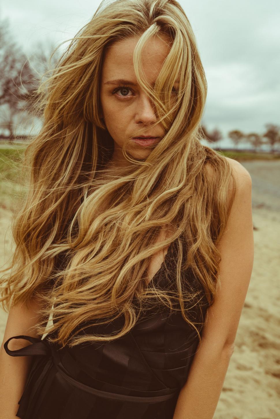Free Image of Intense woman with windblown hair 