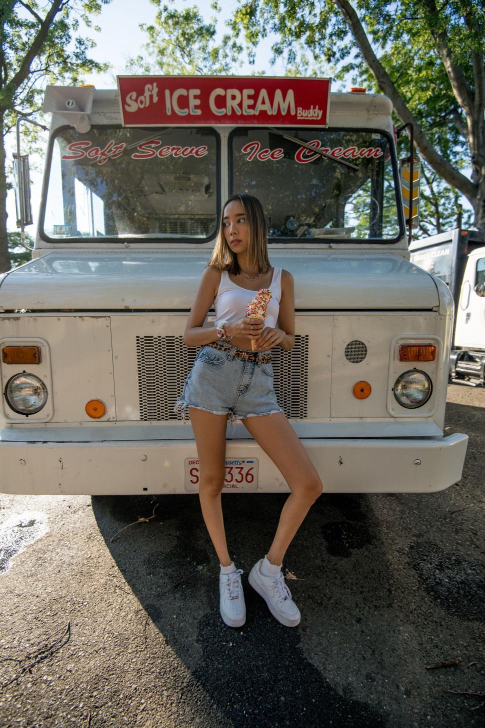Free Image of Young woman at ice cream truck 