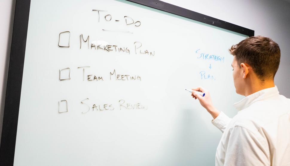 Free Image of Professional reviewing to-do list 