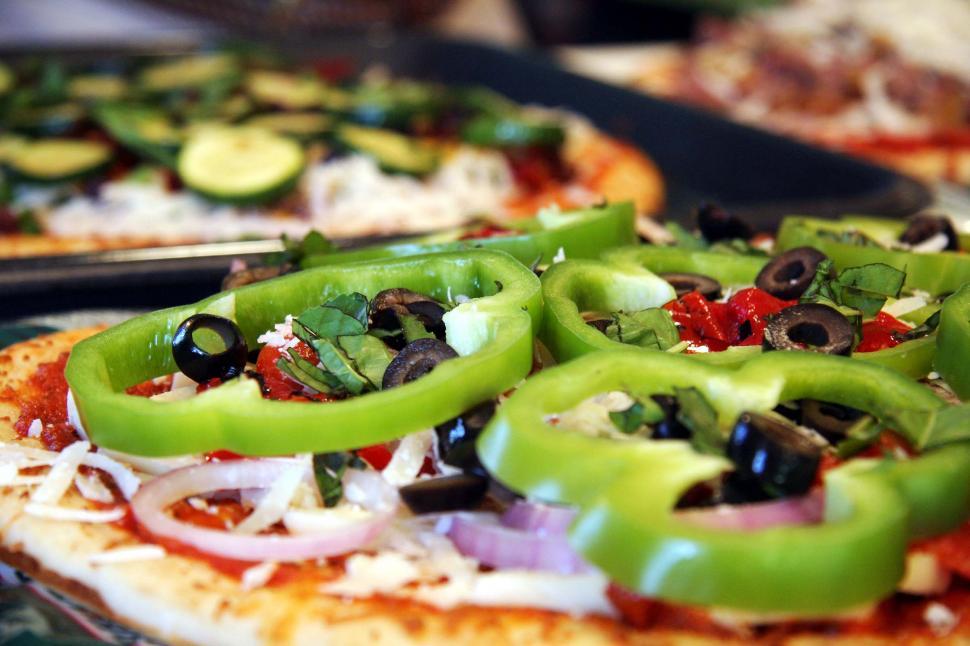 Free Image of Close Up of a Pizza on a Pan 