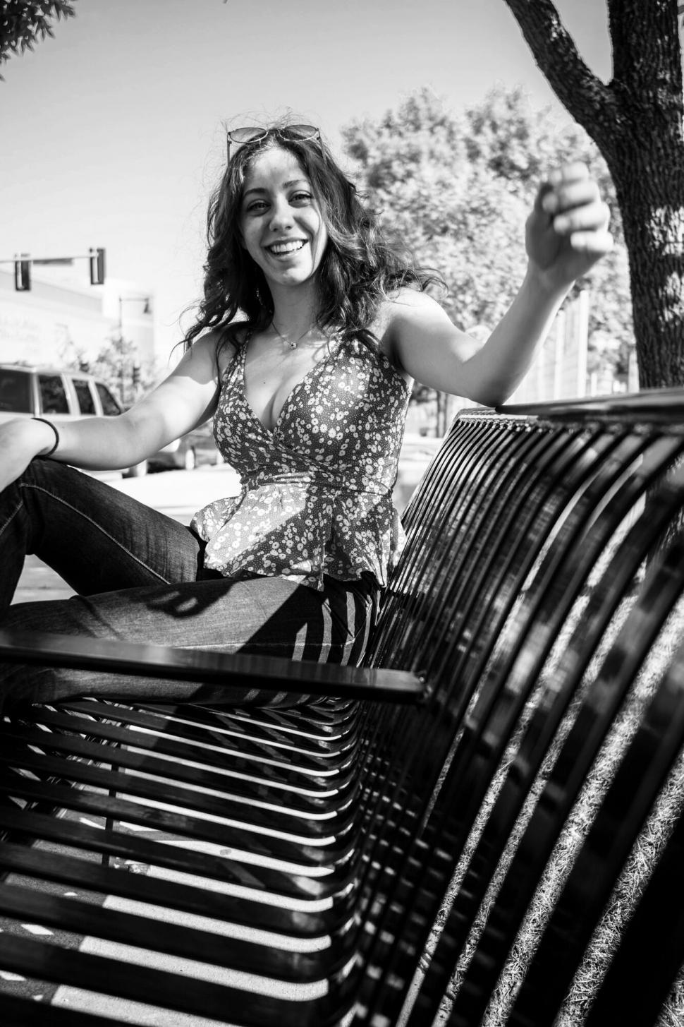 Free Image of Joyful woman reaching out in B&ampW photo 
