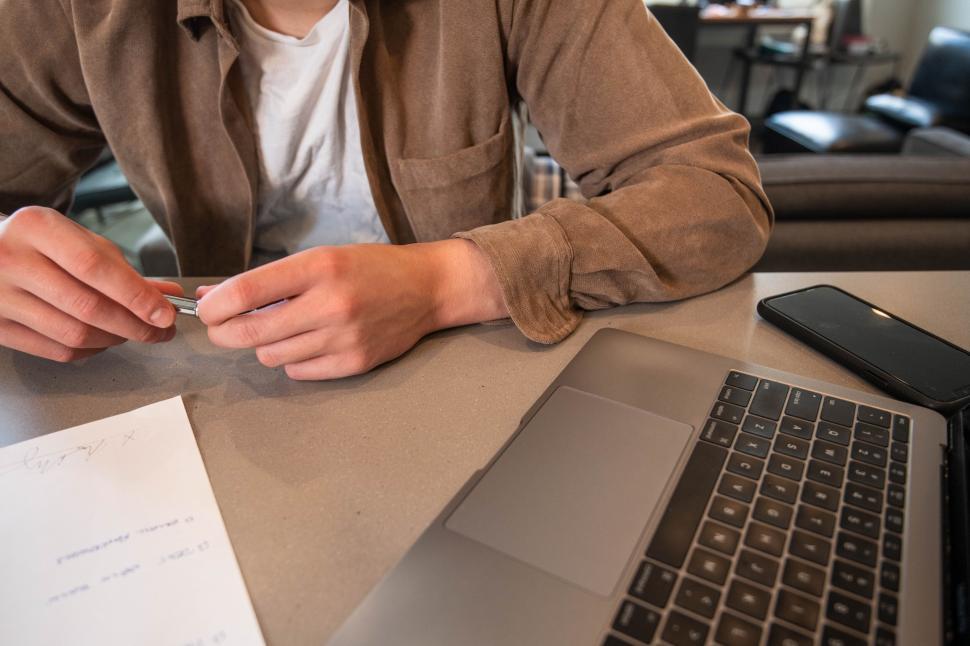 Free Image of Casual work from home setup with laptop 