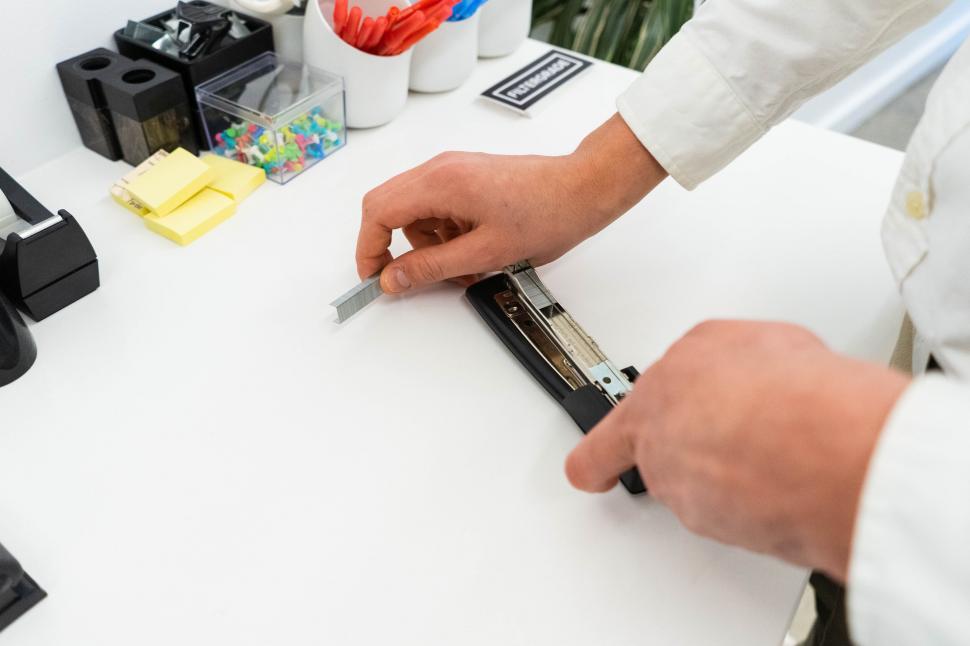 Free Image of Replacing batteries in a remote controller 