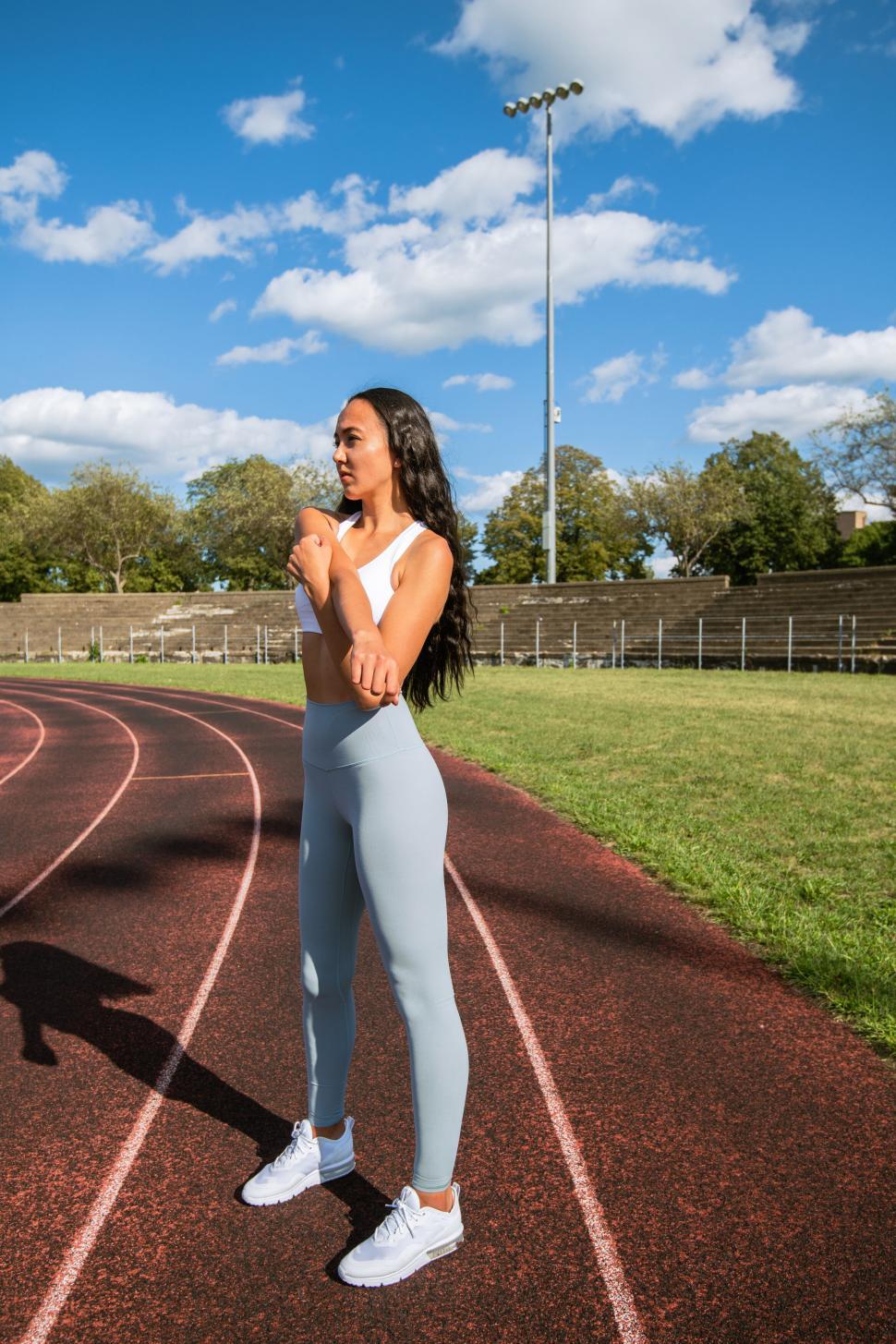Free Image of Athlete poised at the start on track 