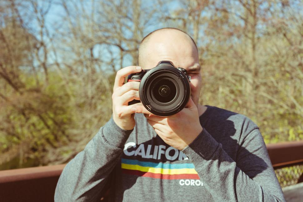 Free Image of Person capturing a moment with camera 