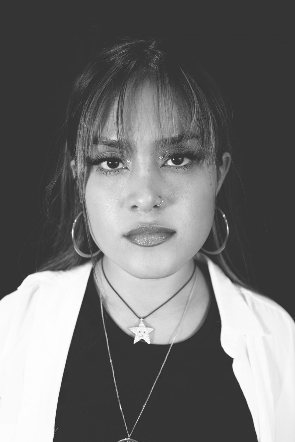 Free Image of Portrait of Young Woman with Earrings 