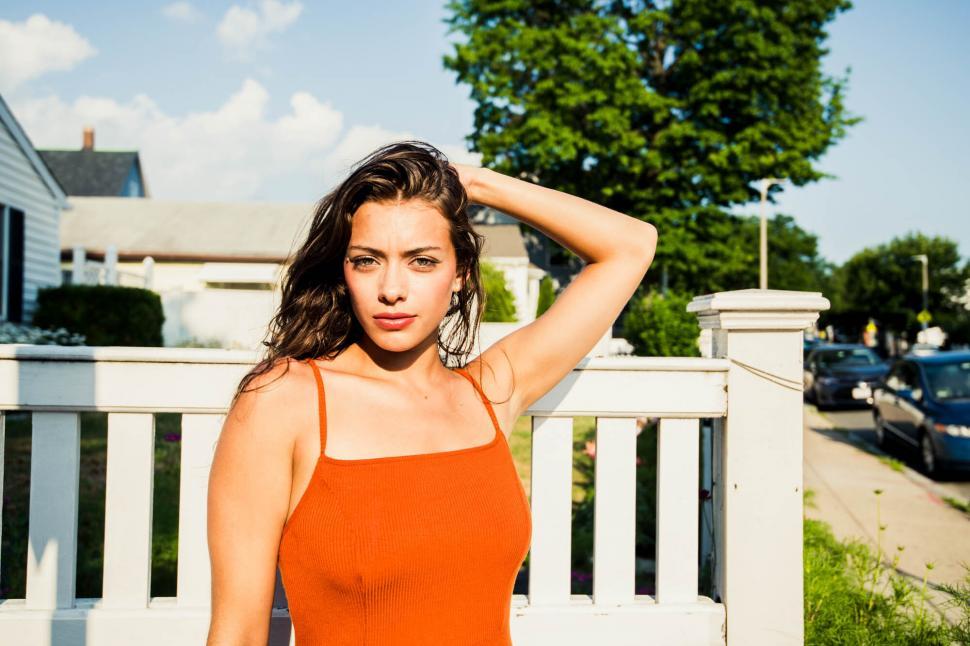 Free Image of Young Woman with Hand in Hair 