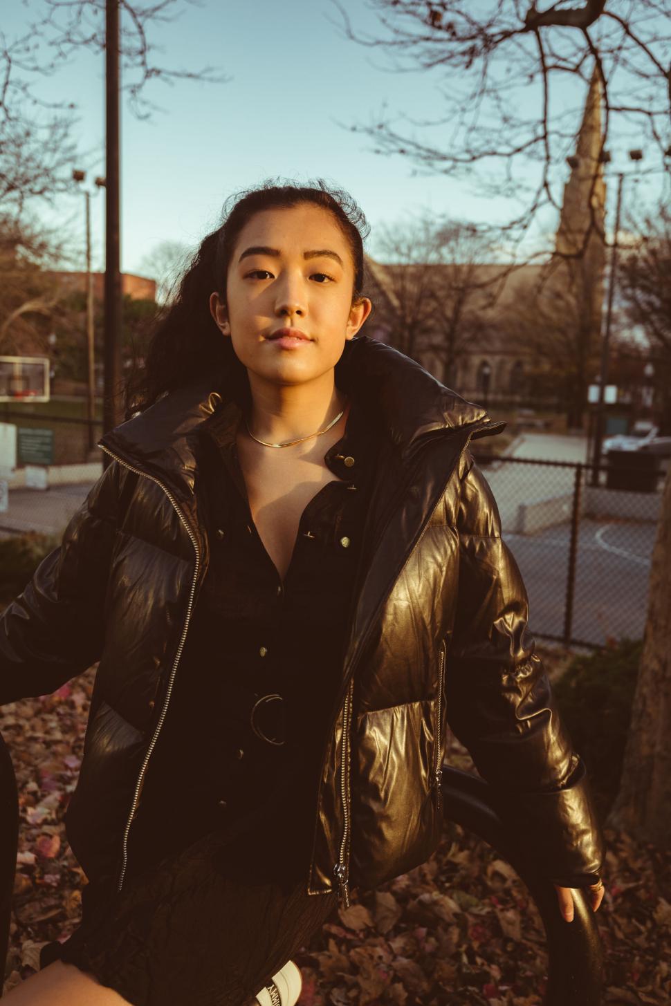 Free Image of Young woman with intense gaze at sunset 