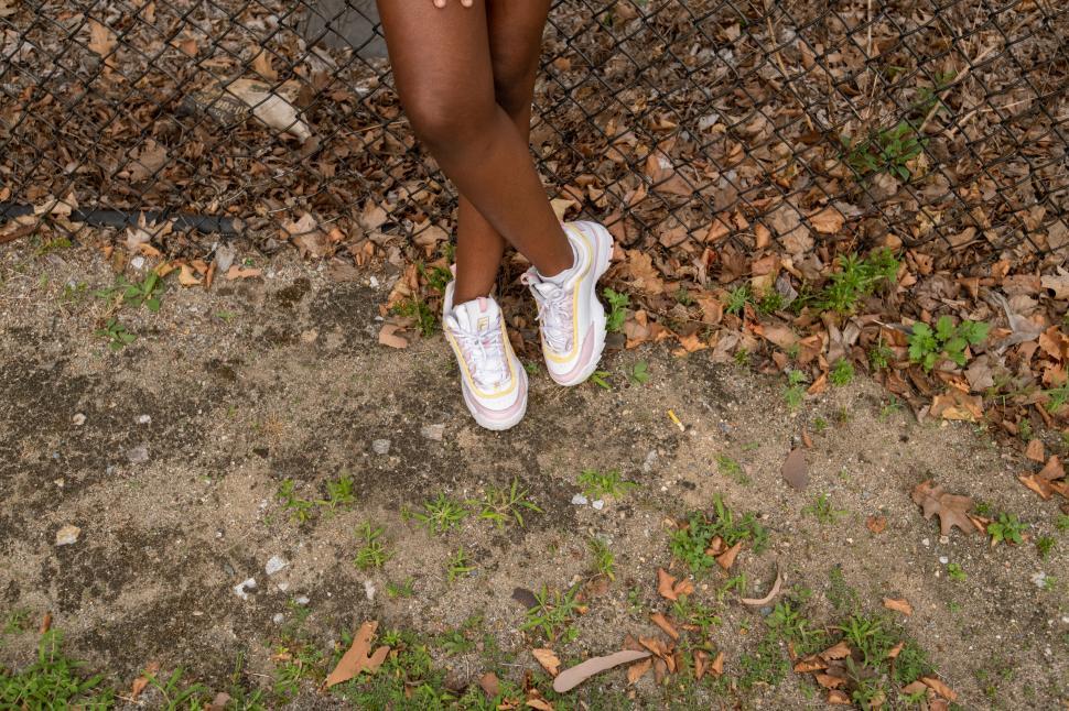 Free Image of Stylish sneakers on urban background 