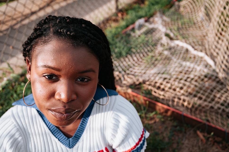 Free Image of Close-up of a woman with braided hair 