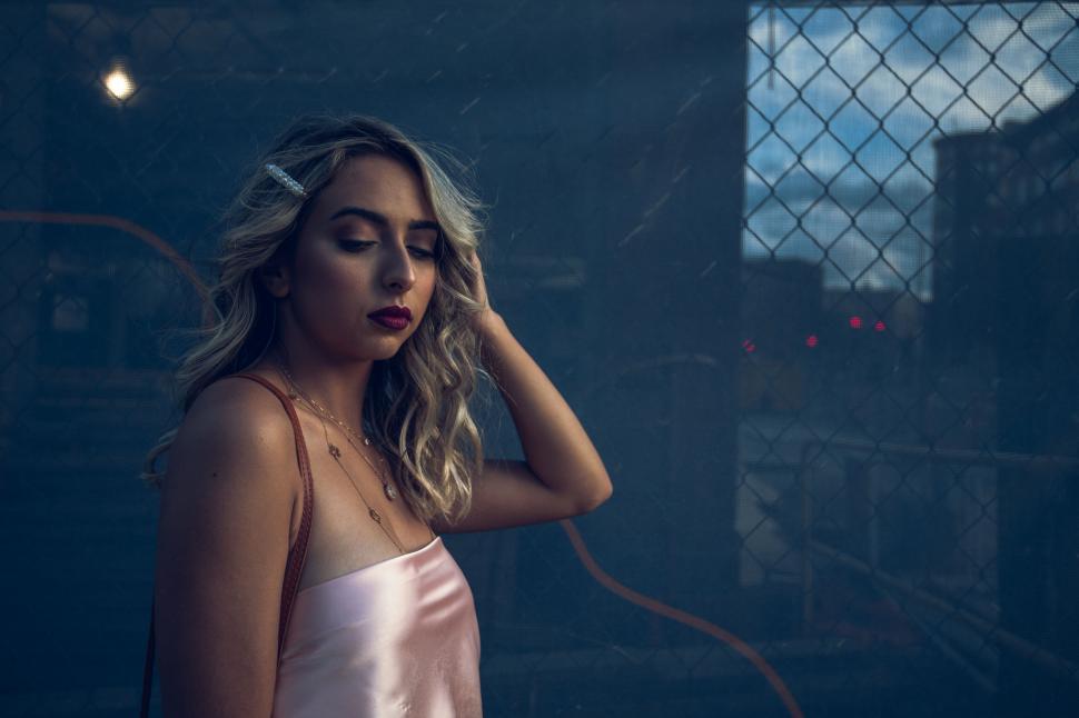 Free Image of Moody evening portrait of a young woman 