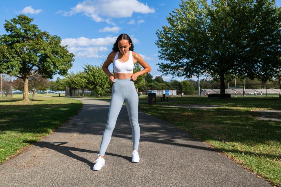 Free Image of Athlete checking fitness tracker after run 