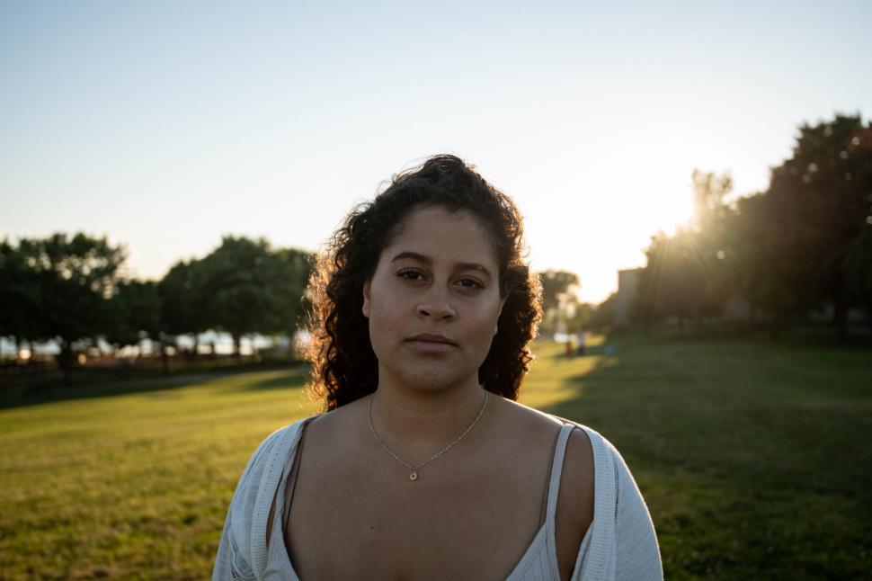 Free Image of Calm expression in golden hour portrait 