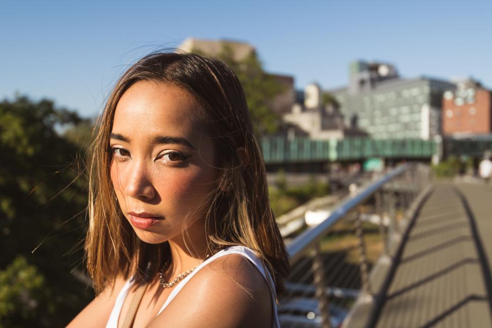 Free Image of Close-up of serious woman outdoors 