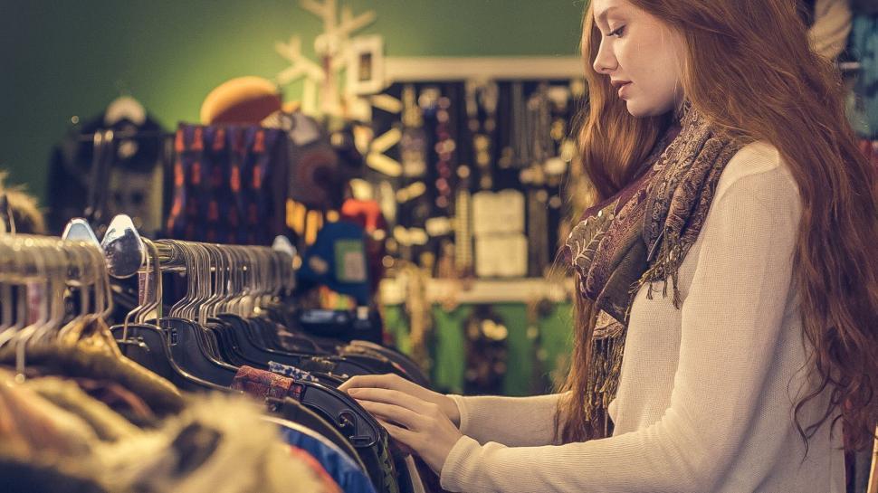 Free Image of Woman shopping for clothing at a boutique 
