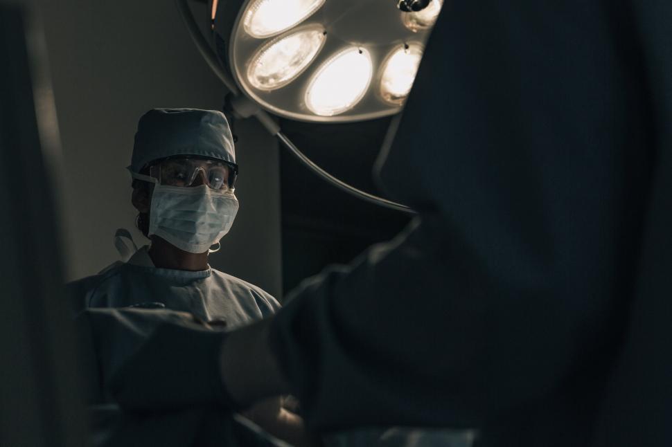 Free Image of Surgeon under professional surgery lights 