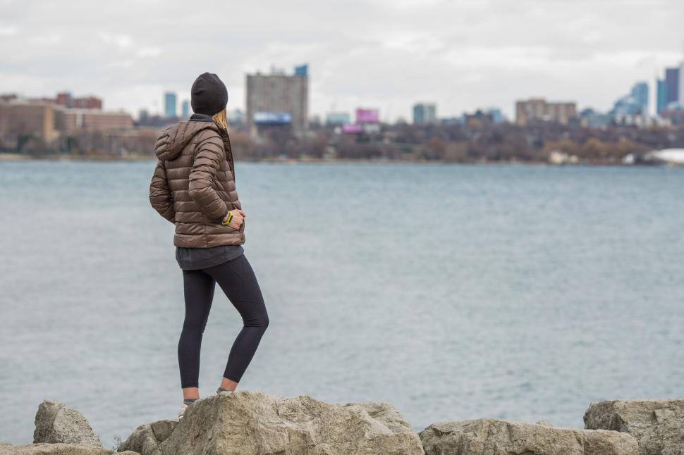 Free Image of Observer overlooking city waterfront 