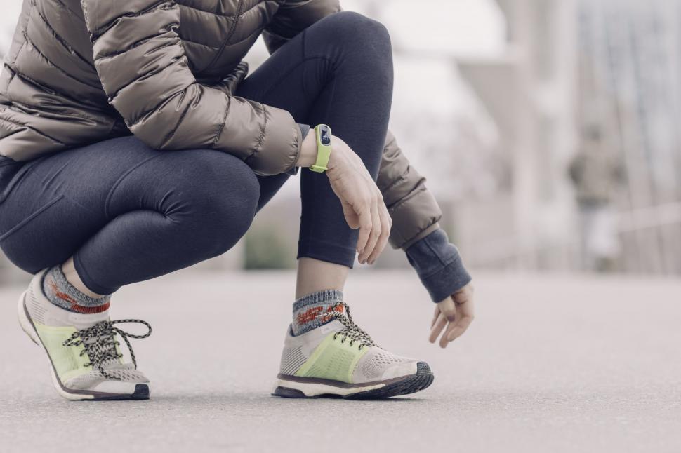 Free Image of Fitness tracker on a runner s wrist outdoors 