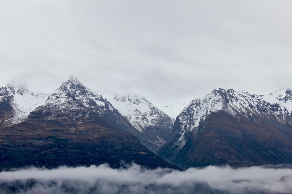 Free Image of Majestic snow-capped mountain peaks 