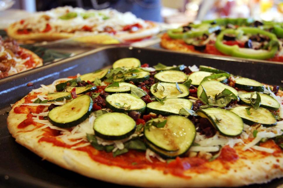 Free Image of Close Up of a Pizza on a Pan 