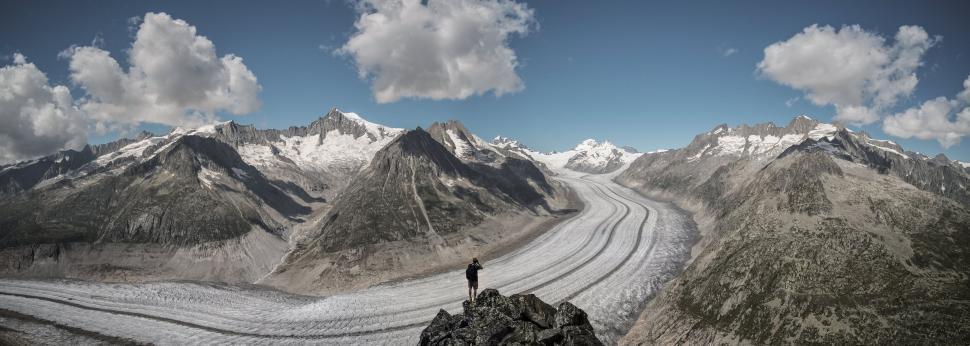 Free Image of Panoramic view of a person on a glacier 