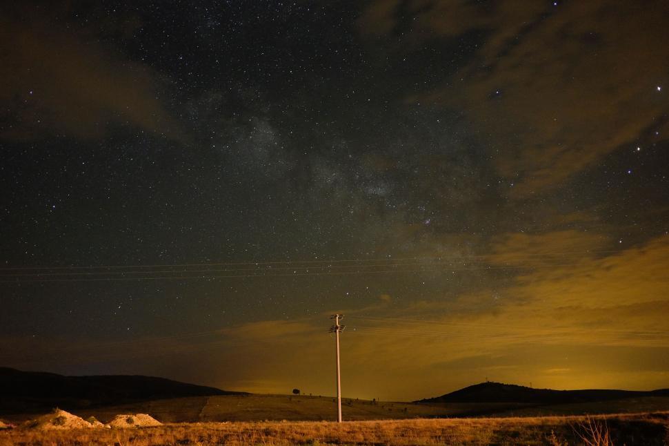 Free Image of Night sky full of stars over a field 