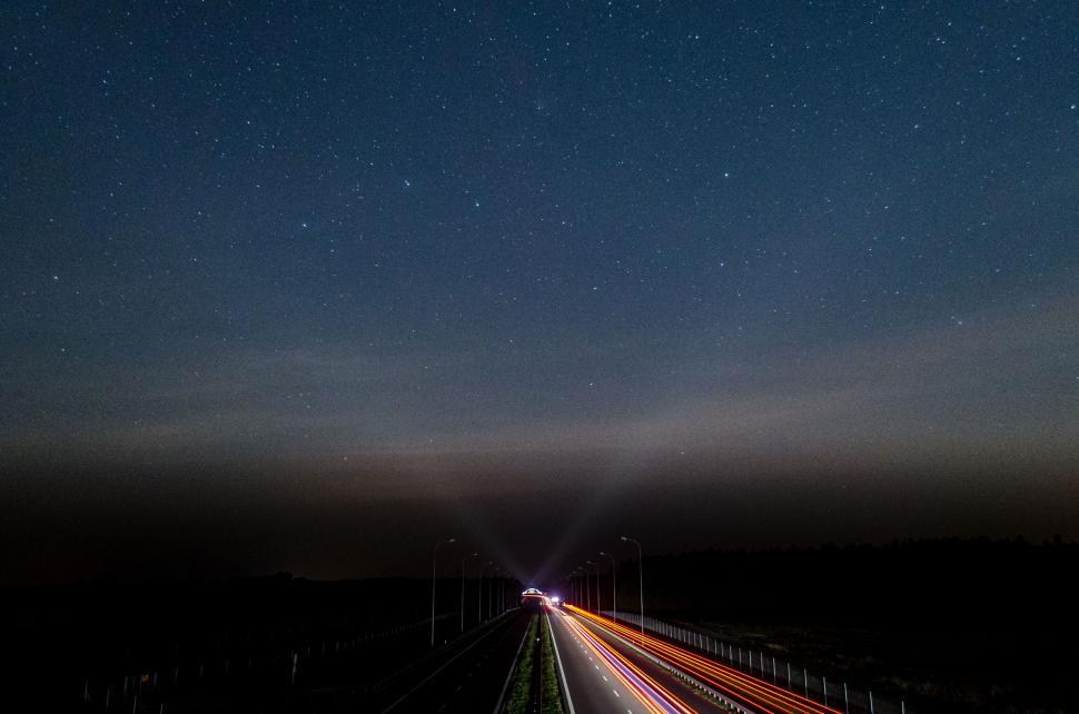 Free Image of Night Highway Under Starry Sky with Light Trails 