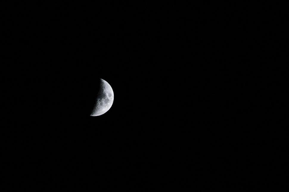 Free Image of Half moon in a black night sky 