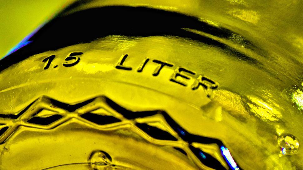 Free Image of Close view of embossed  15 LITER  on plastic 