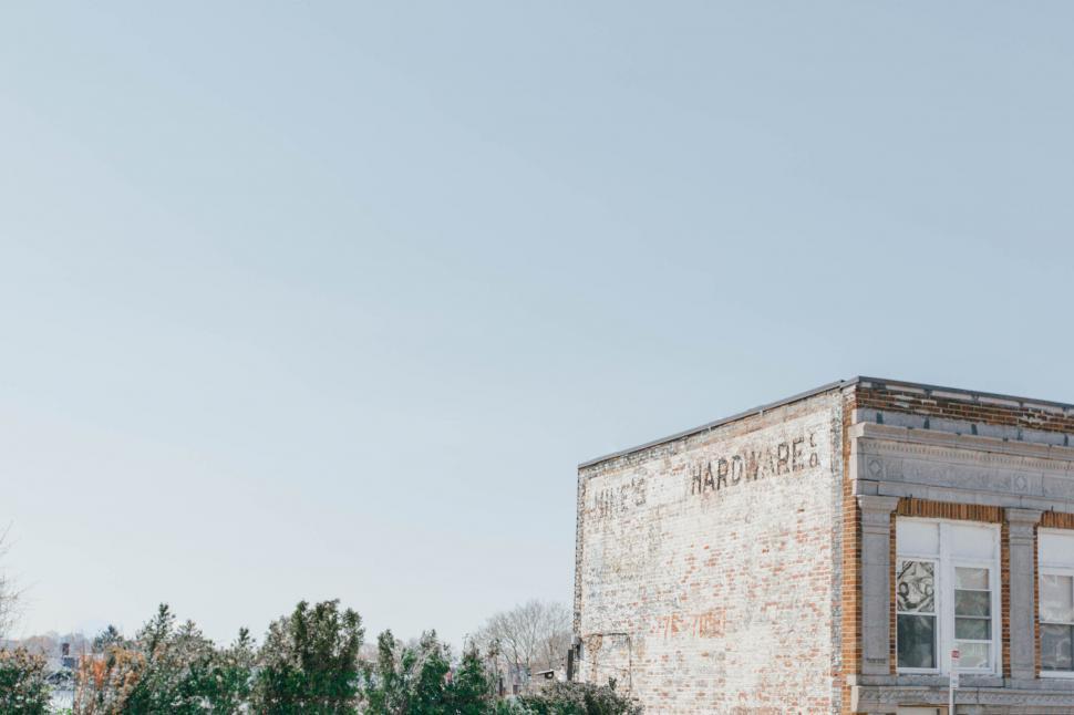 Free Image of Vintage brick building with clear sky 