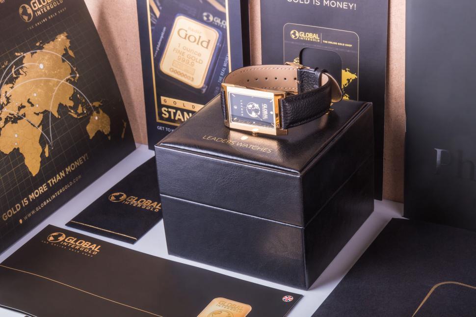Free Image of Luxury watch on box with gold accents 
