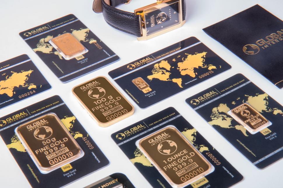 Free Image of Collection of gold cards and luxury watch 
