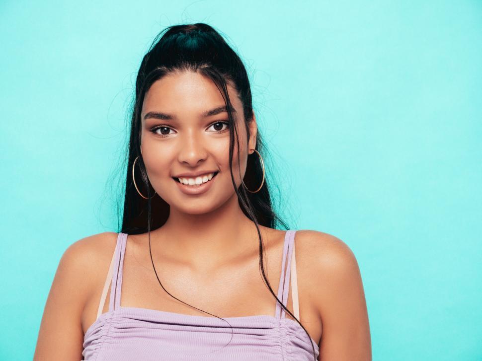Free Image of A woman smiling at camera 