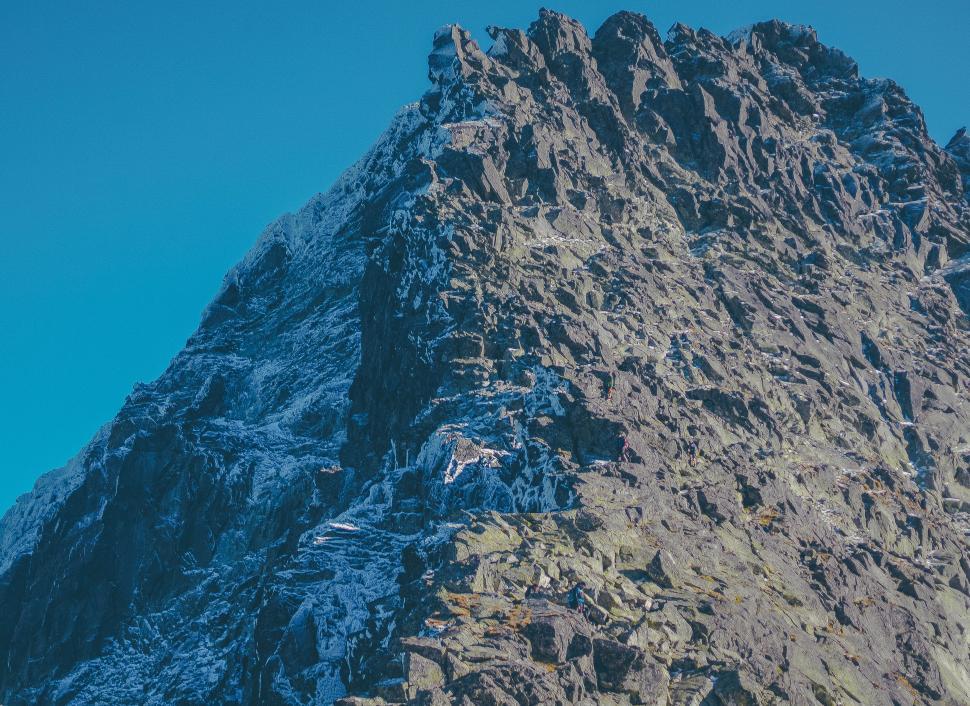 Free Image of Rocky mountain peak with a textured surface 