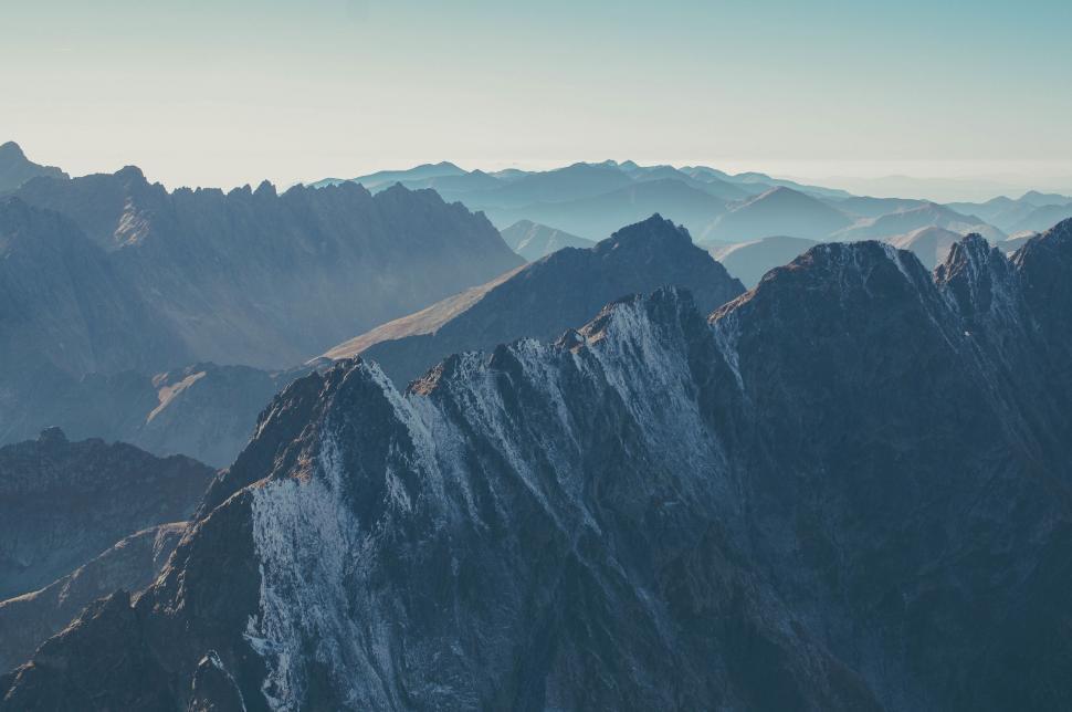 Free Image of Majestic mountain peaks in soft light 