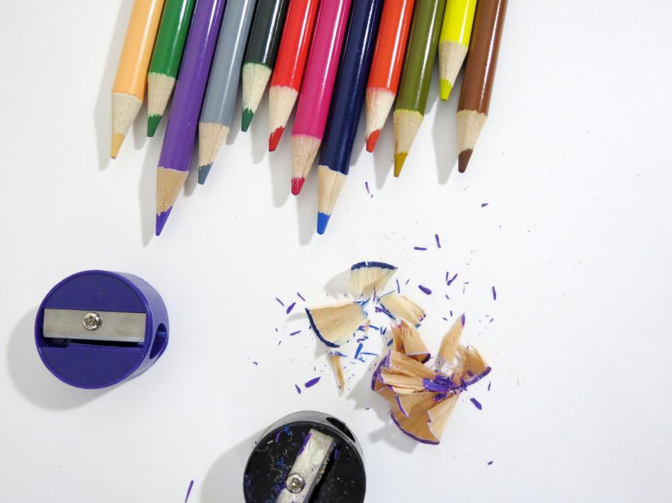 Free Image of Colorful pencils with shavings and sharpener 