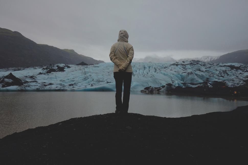 Free Image of Silhouette of person before glacier 