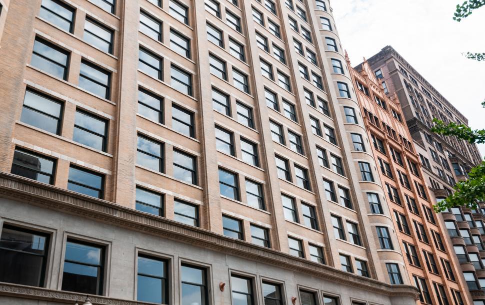 Free Image of Modern high-rise buildings with detailed facade 