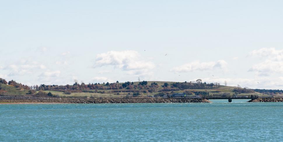 Free Image of Seascape with distant land and clear sky 