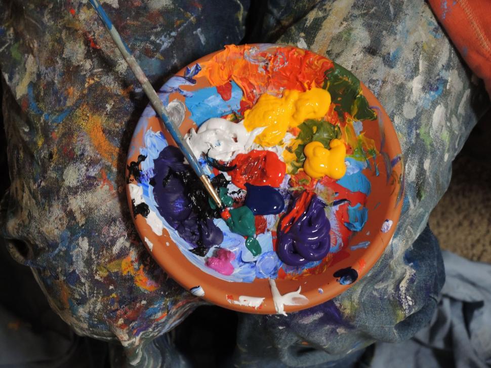 Free Image of Painter s colorful palette with vibrant paints 